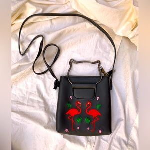 Black flamingo purse with cat head handles